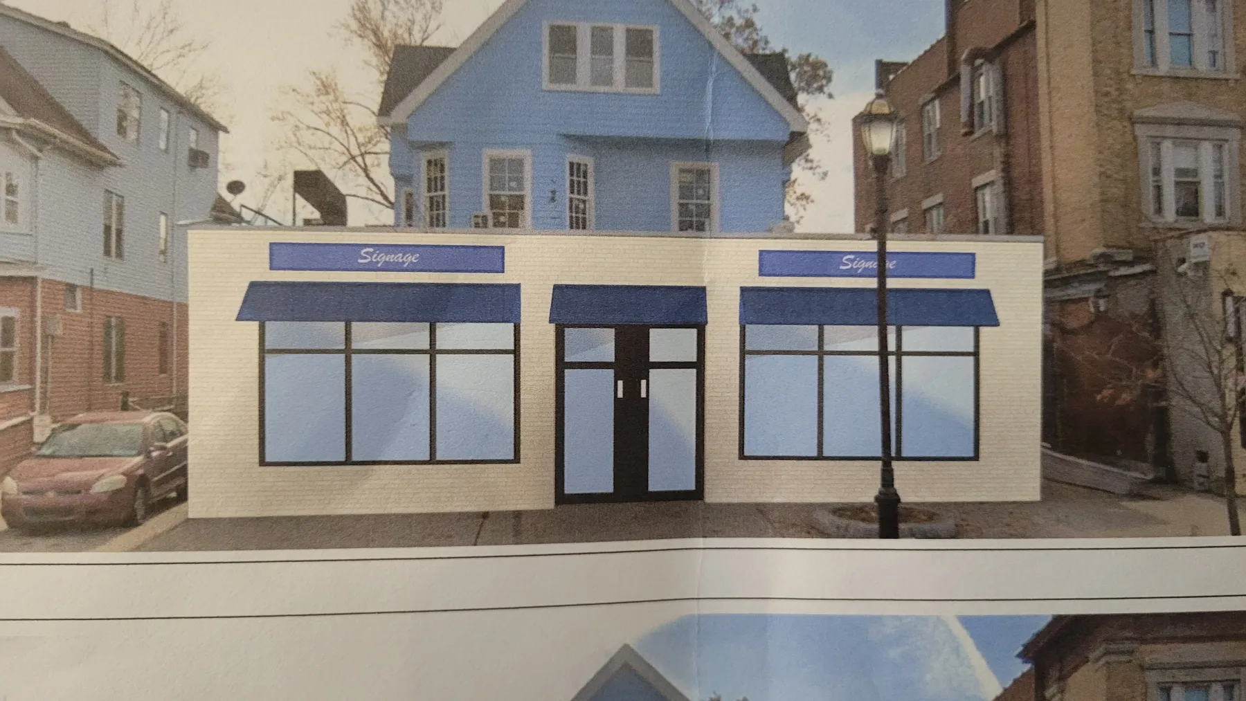 The project design study establishes the intended glazing, entrances, and awning rhythm before construction.