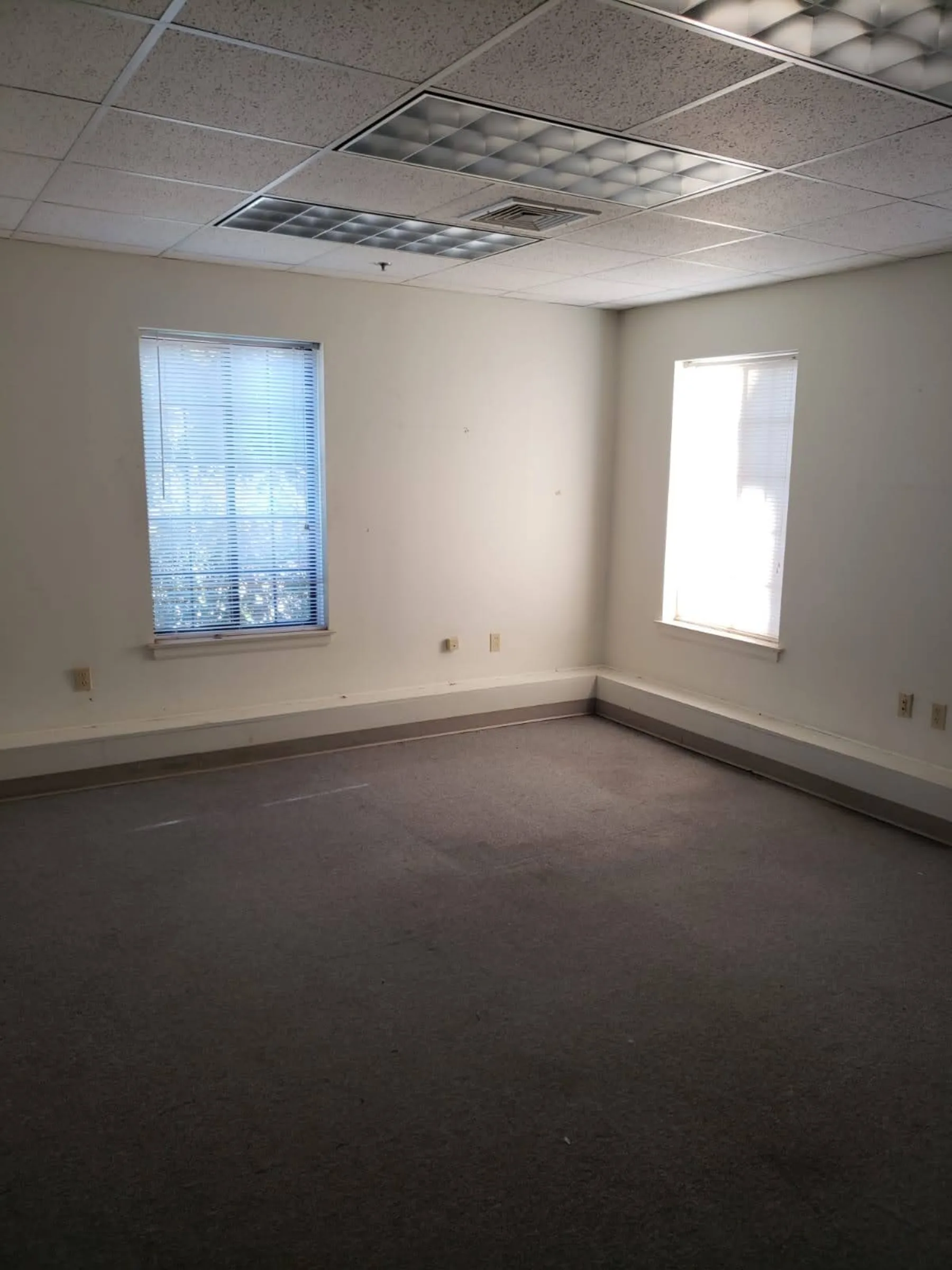 A vacant office suite records the interior condition before tenant improvements and furnishing.
